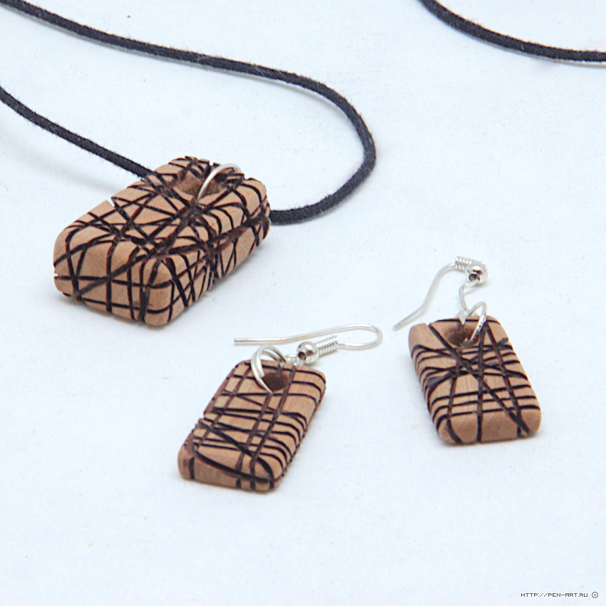 Wooden pendant and earrings from pear